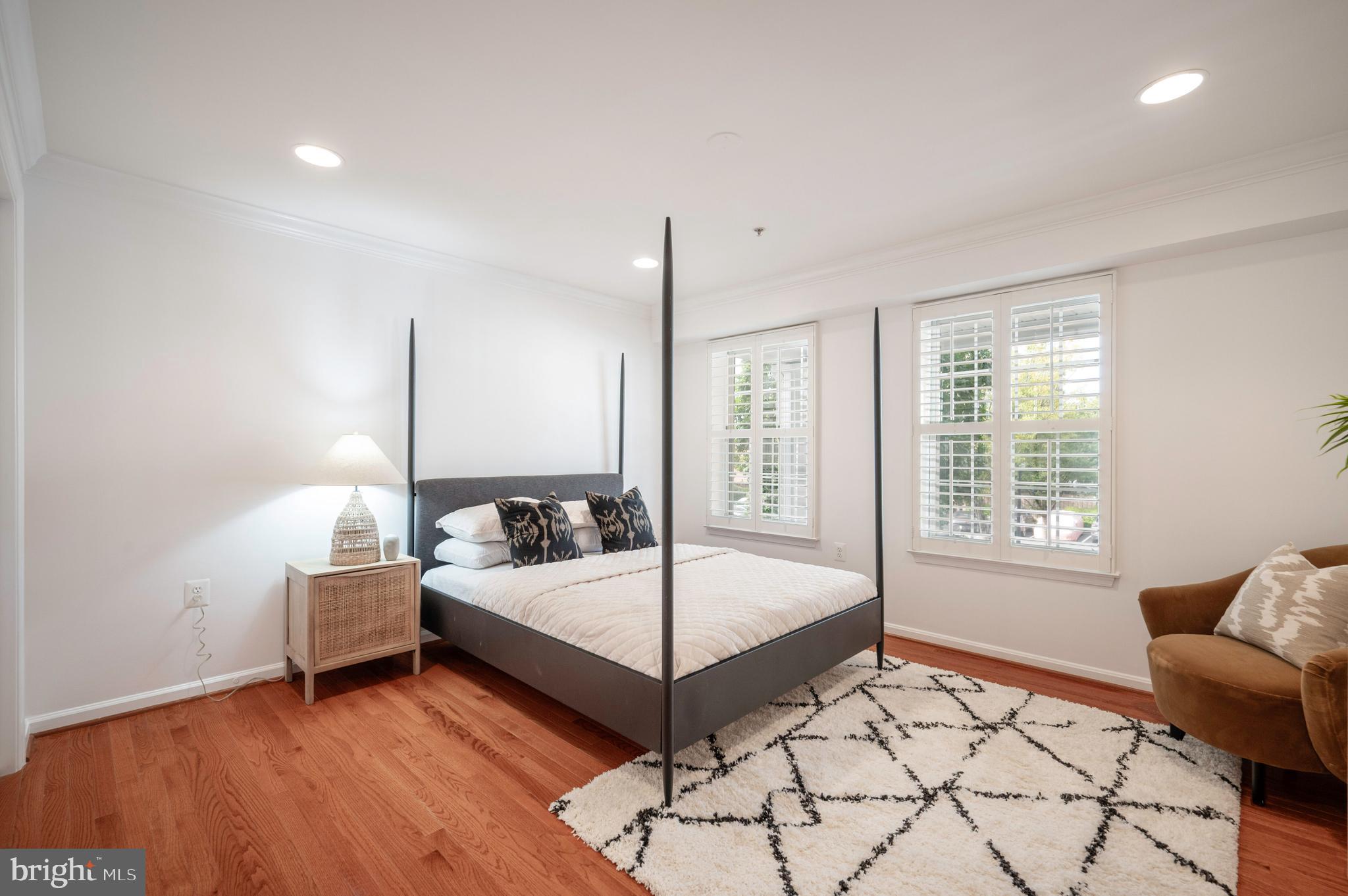 1422 Roundhouse Lane, Unit 1422 Alexandria, VA 22314 - Photo 21 of 73 a bedroom with a bed and a window