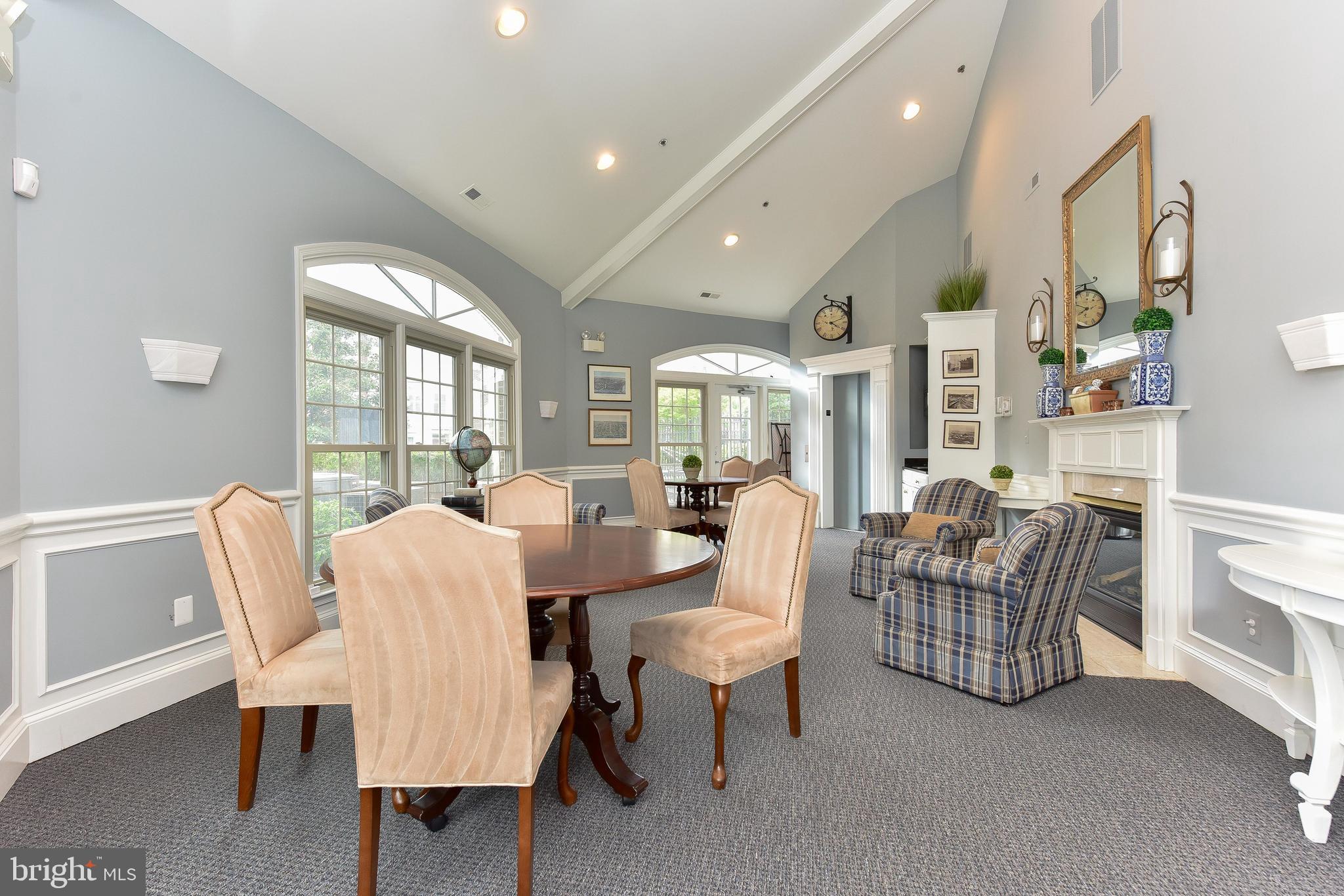 1422 Roundhouse Lane, Unit 1422 Alexandria, VA 22314 - Photo 37 of 73 a living room with furniture and a large window