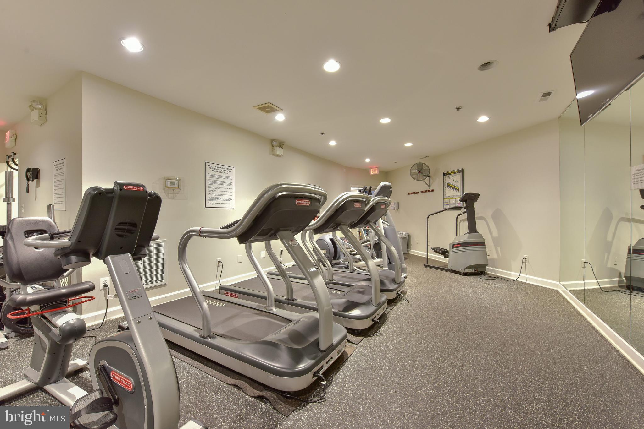 1422 Roundhouse Lane, Unit 1422 Alexandria, VA 22314 - Photo 39 of 73 a view of a room with gym equipment