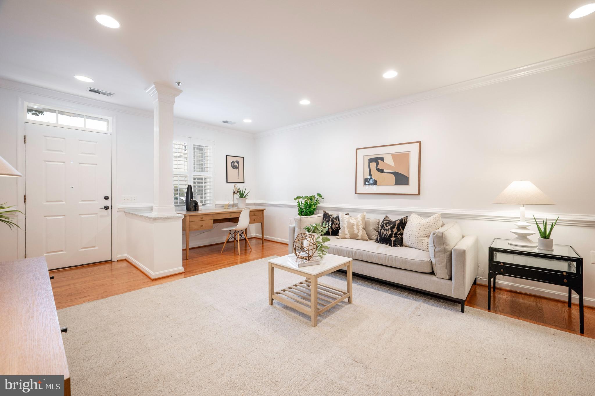 1422 Roundhouse Lane, Unit 1422 Alexandria, VA 22314 - Photo 4 of 73 a living room with furniture and a table