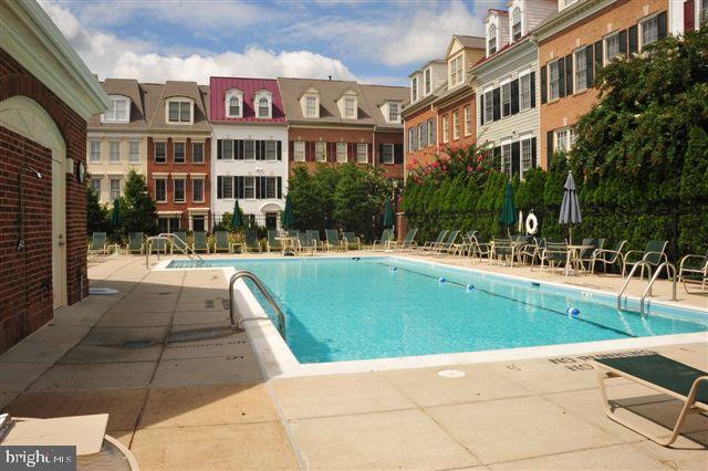 1422 Roundhouse Lane, Unit 1422 Alexandria, VA 22314 - Photo 48 of 73 a view of outdoor space yard swimming pool and sitting area