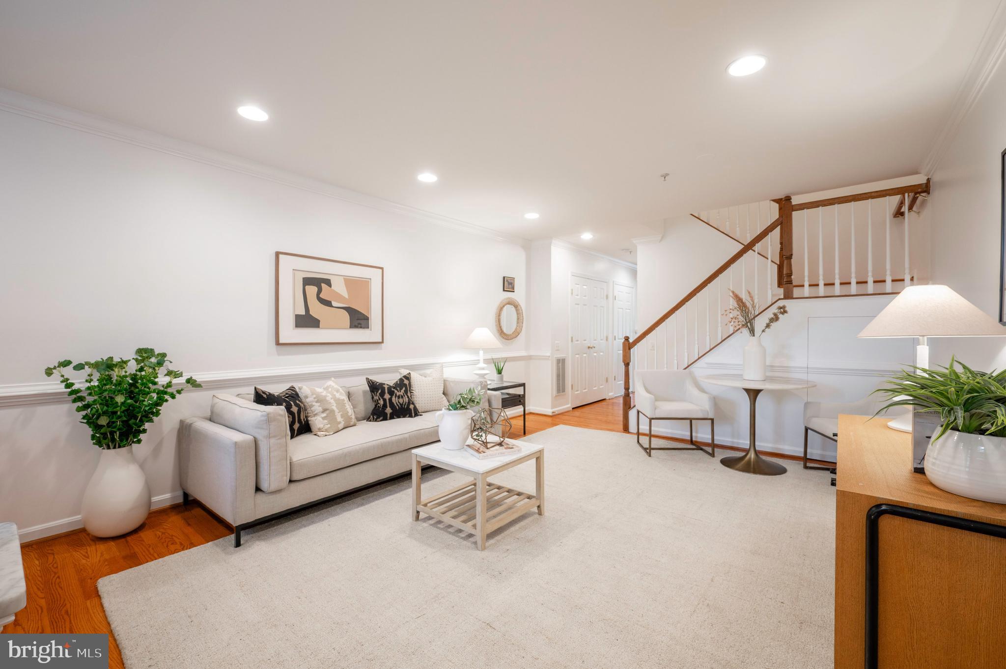 1422 Roundhouse Lane, Unit 1422 Alexandria, VA 22314 - Photo 6 of 73 a living room with furniture and wooden floor