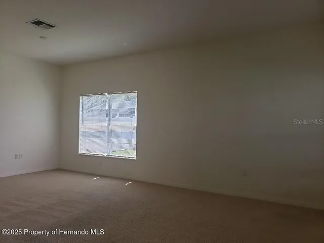an empty room with a window