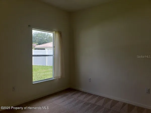 an empty room with a window