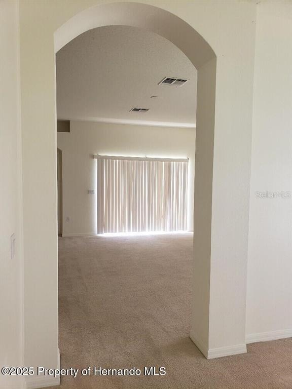15206 Copper Loop Brooksville, FL 34604 - Photo 5 of 29 a view of an empty room with a window