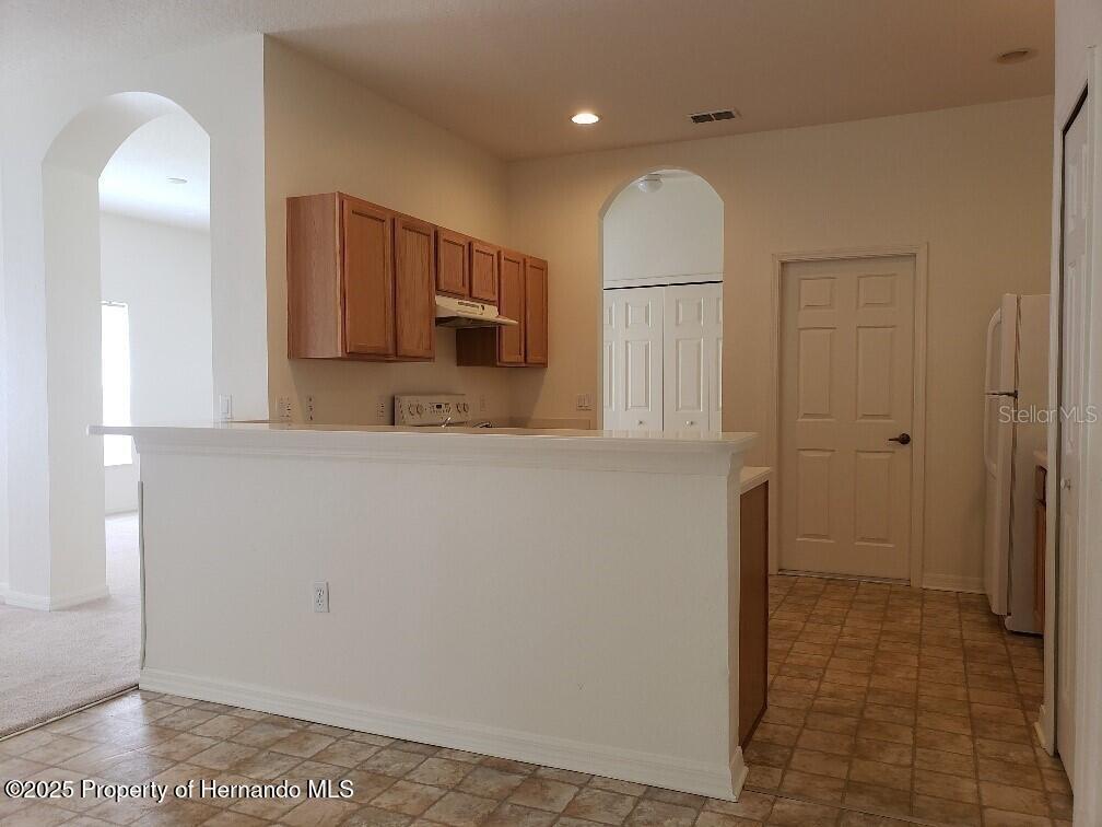 15206 Copper Loop Brooksville, FL 34604 - Photo 7 of 29 a view of a kitchen with a sink