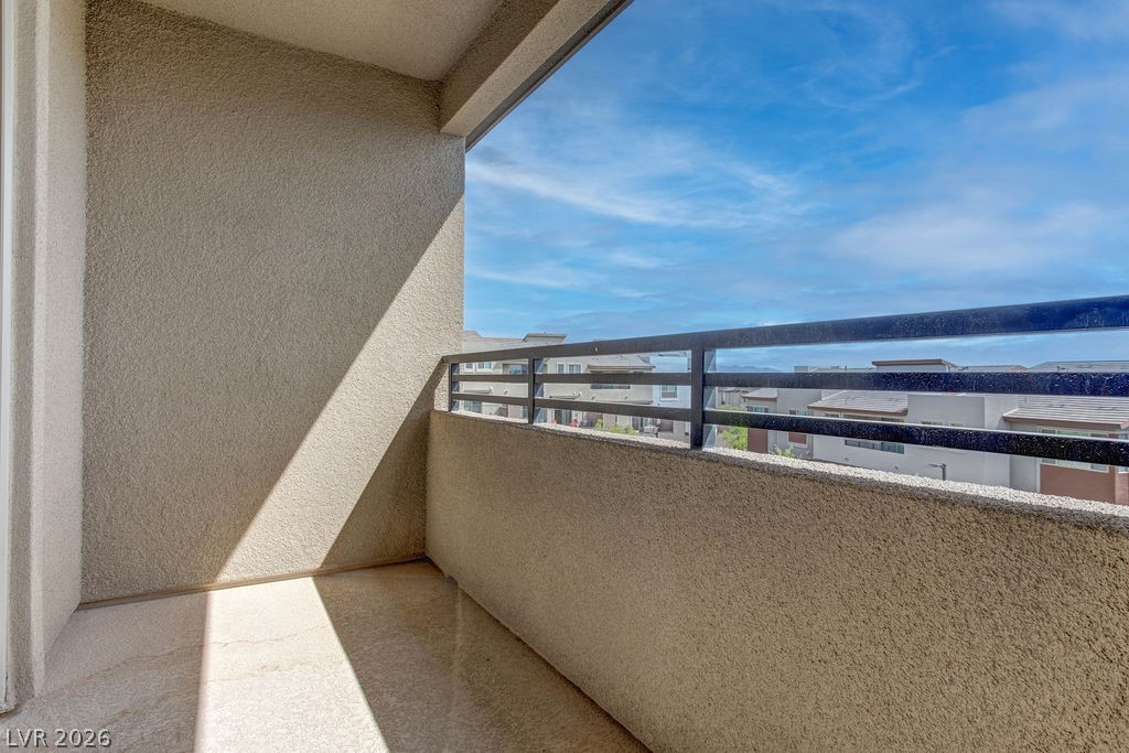 646 Infinity Rdg Street Las Vegas, NV 89138 - Photo 27 of 40 Private balcony off of the primary bedroom #1 with great views of the city