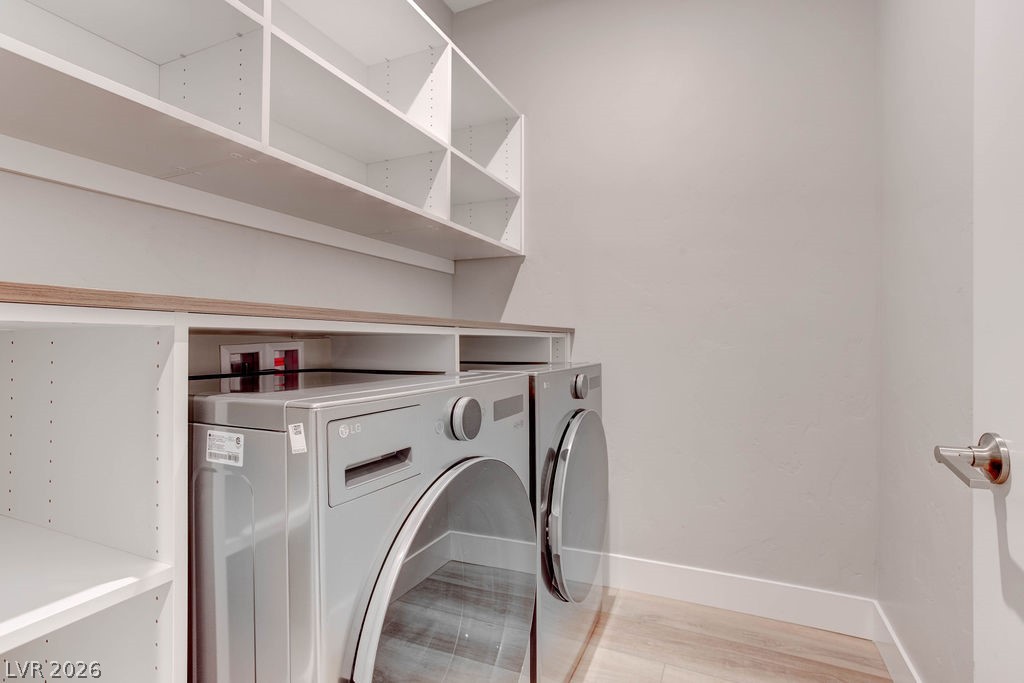 646 Infinity Rdg Street Las Vegas, NV 89138 - Photo 31 of 40 Separate laundry room with built-in shelves