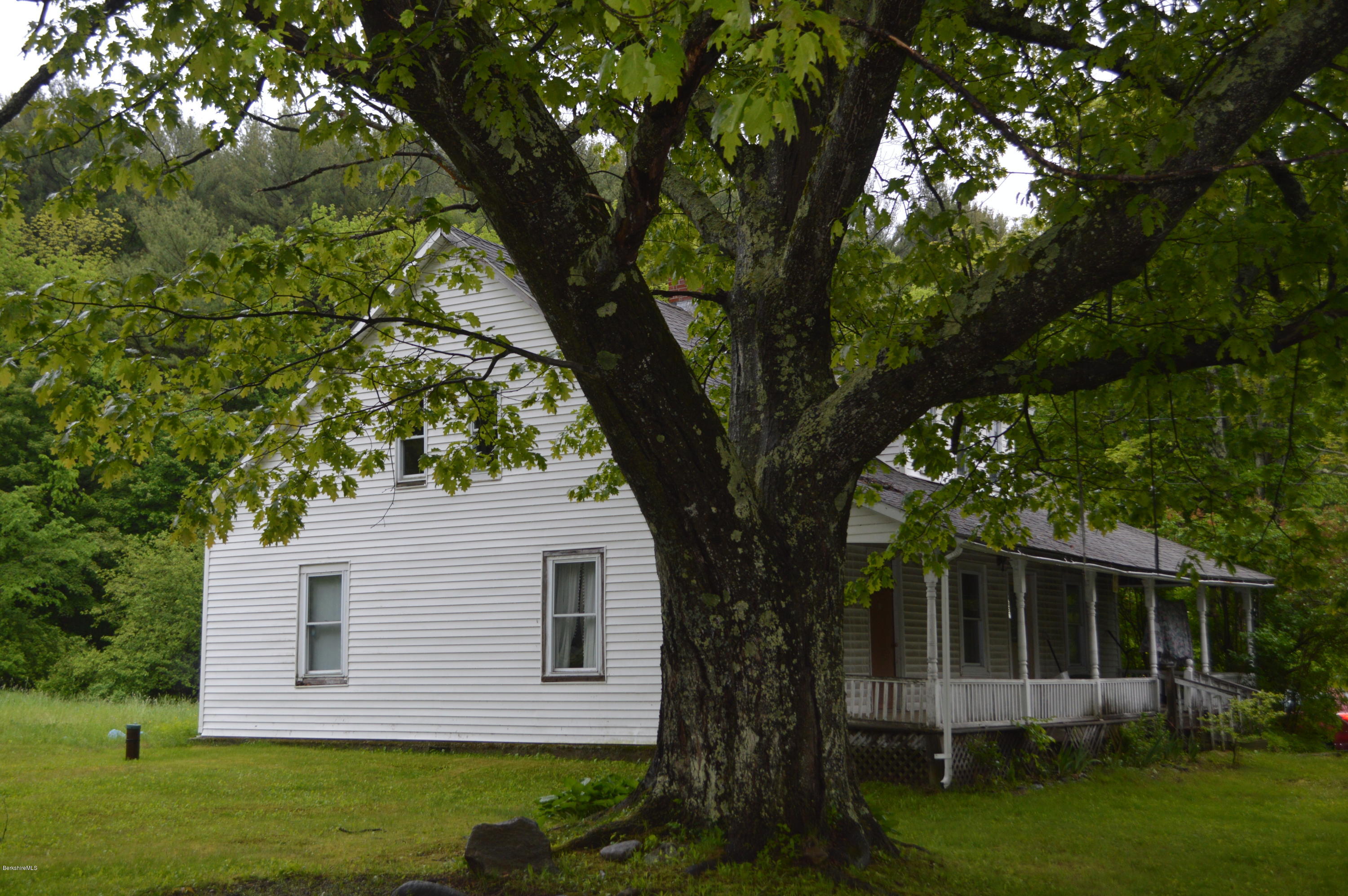 1892 North Main Road Otis, MA 01253 - Photo 1 of 19 front view of a house with a yard