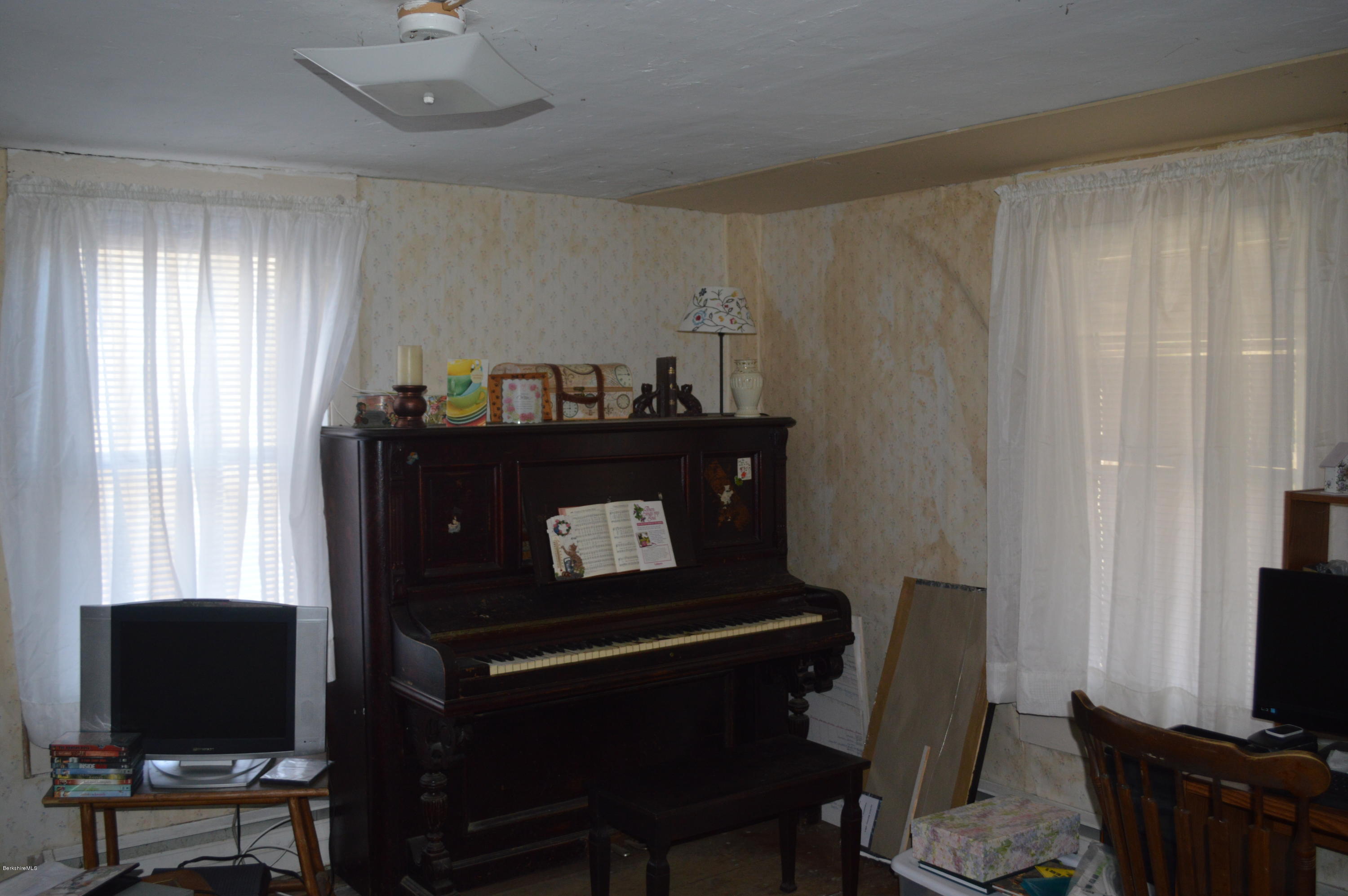 1892 North Main Road Otis, MA 01253 - Photo 4 of 19 a view of a workspace with furniture and a window