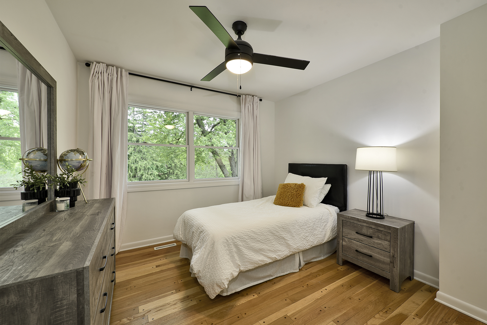 144 North Highland Road Inverness, IL 60067 - Photo 24 of 49 a bedroom with a bed and wooden floor