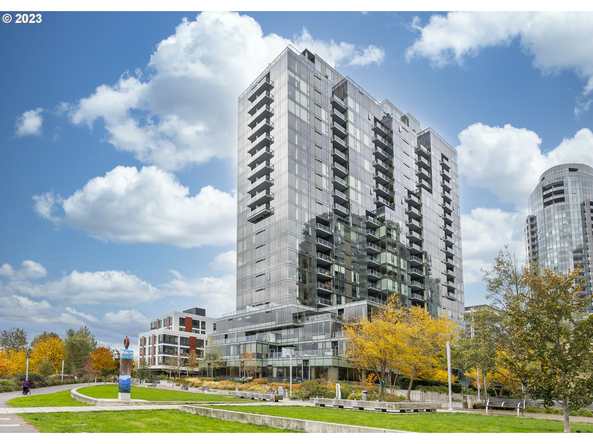 841 Southwest Gaines Street, Unit 1912 Portland, OR 97239 - Photo 1 of 32 a city view with tall buildings
