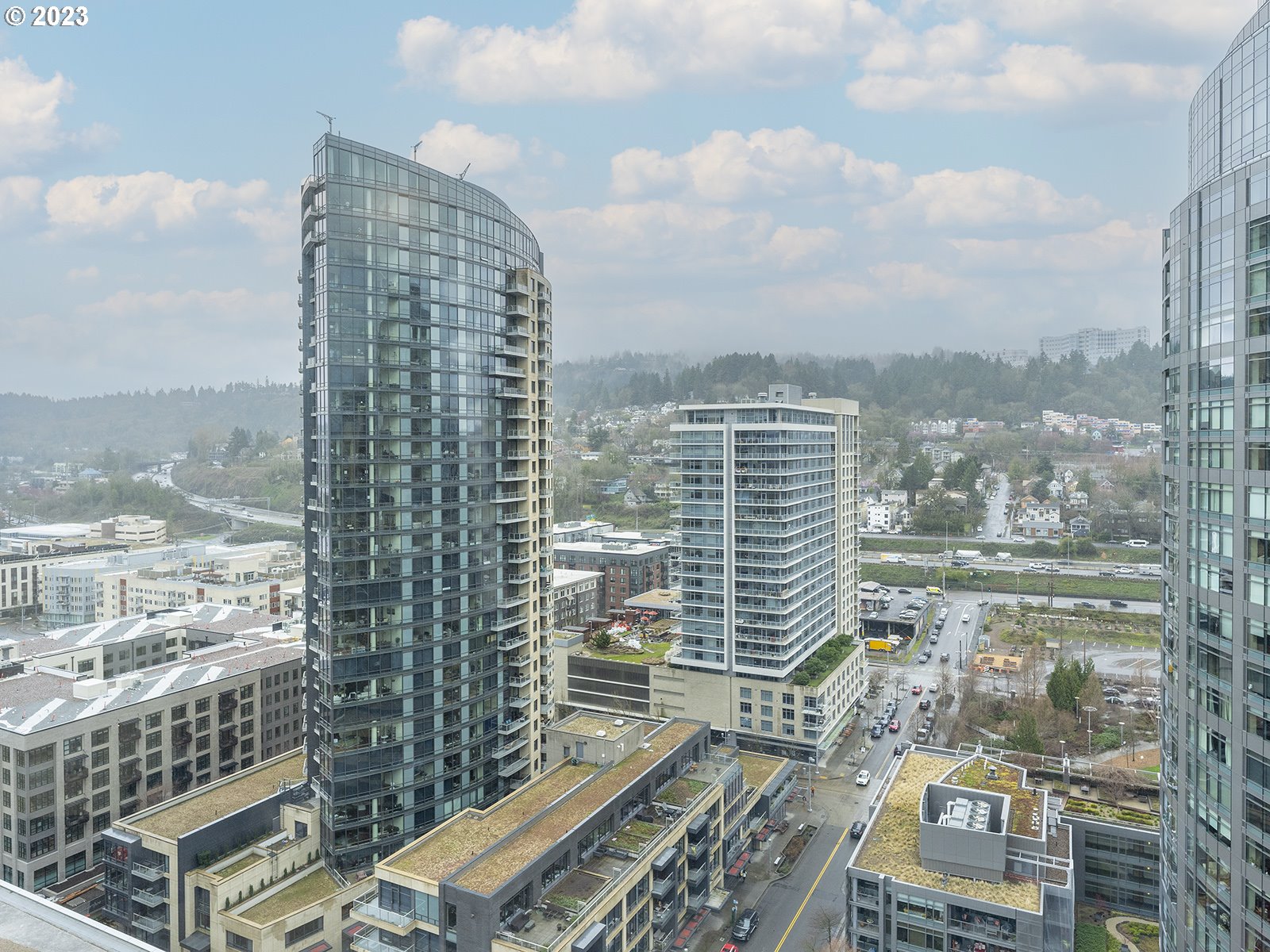 841 Southwest Gaines Street, Unit 1912 Portland, OR 97239 - Photo 18 of 32 a view of a city with tall buildings