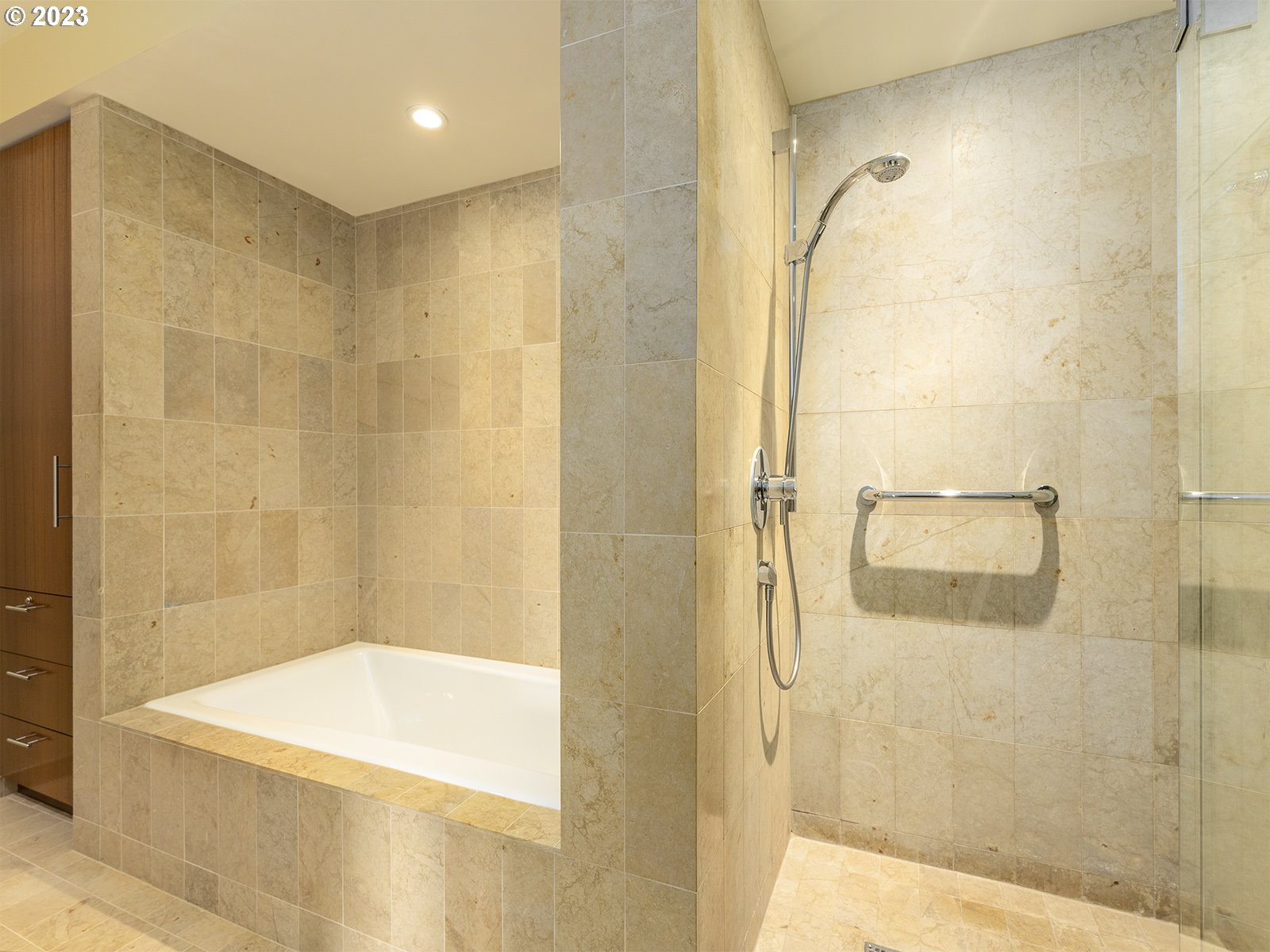 841 Southwest Gaines Street, Unit 1912 Portland, OR 97239 - Photo 24 of 32 a bathroom with a shower