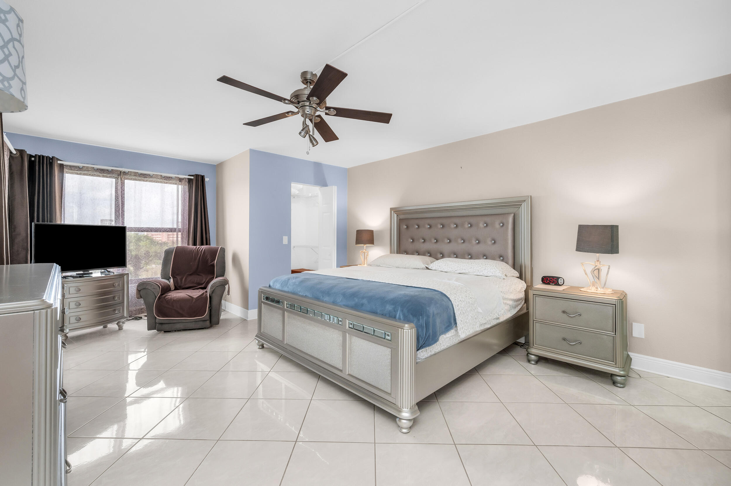 14475 Strathmore Lane, Unit 602 Delray Beach, FL 33446 - Photo 15 of 28 a bedroom with a bed and a couch