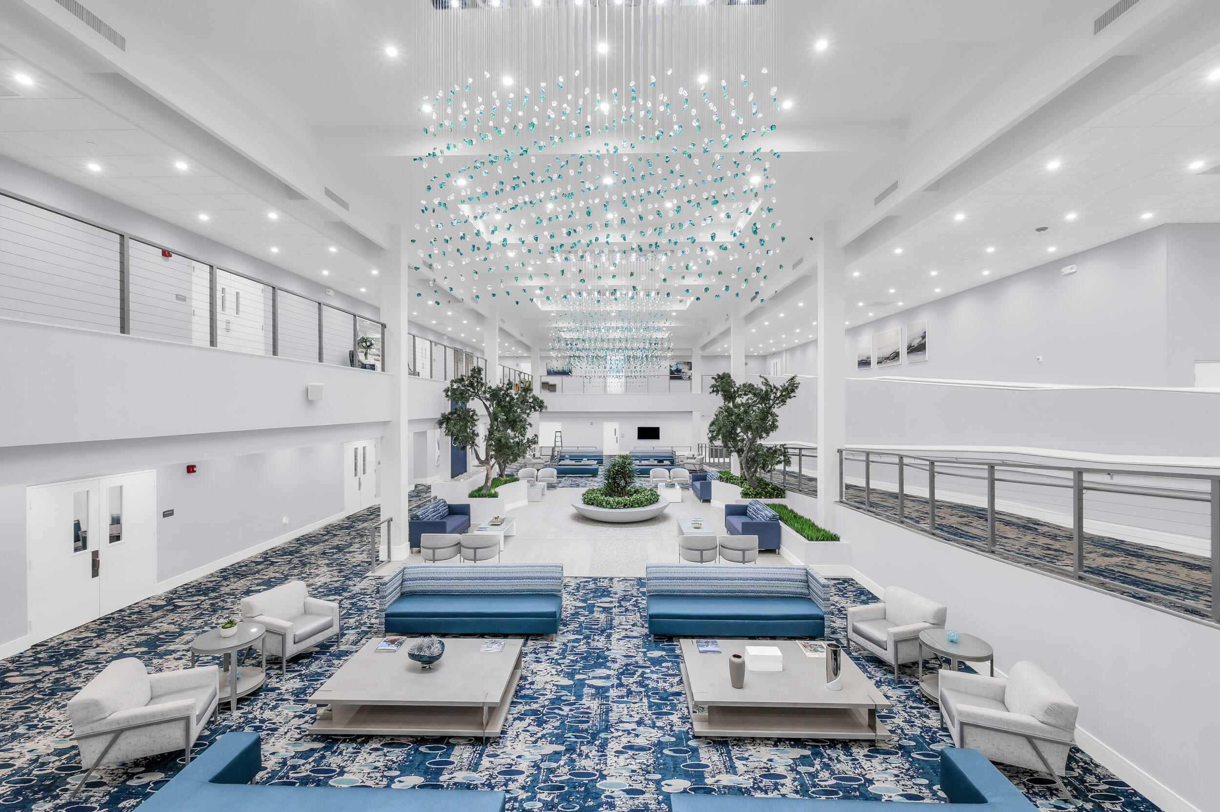 14475 Strathmore Lane, Unit 602 Delray Beach, FL 33446 - Photo 19 of 28 a view of a living room and chandelier