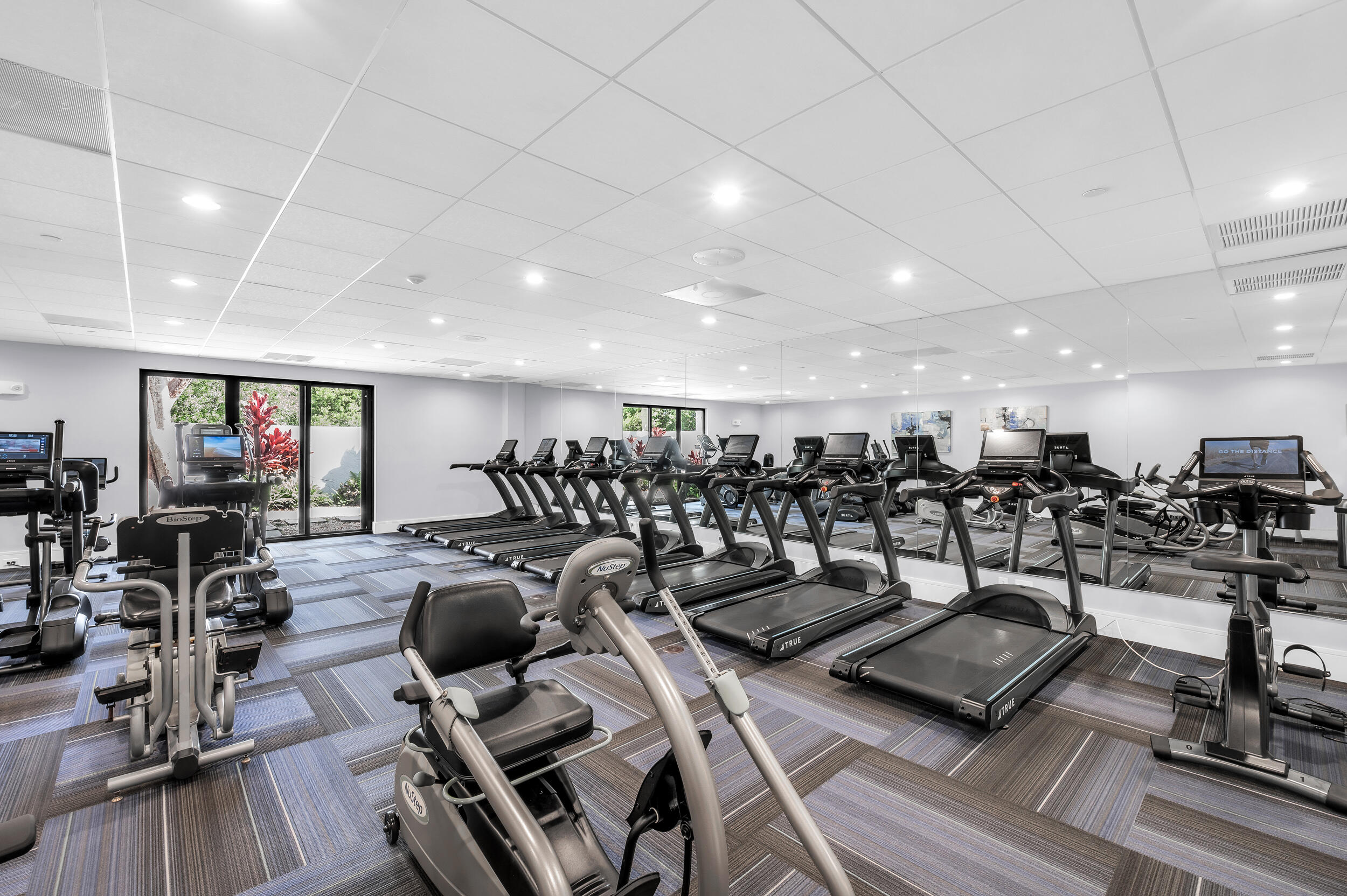 14475 Strathmore Lane, Unit 602 Delray Beach, FL 33446 - Photo 21 of 28 a view of a room with gym equipment