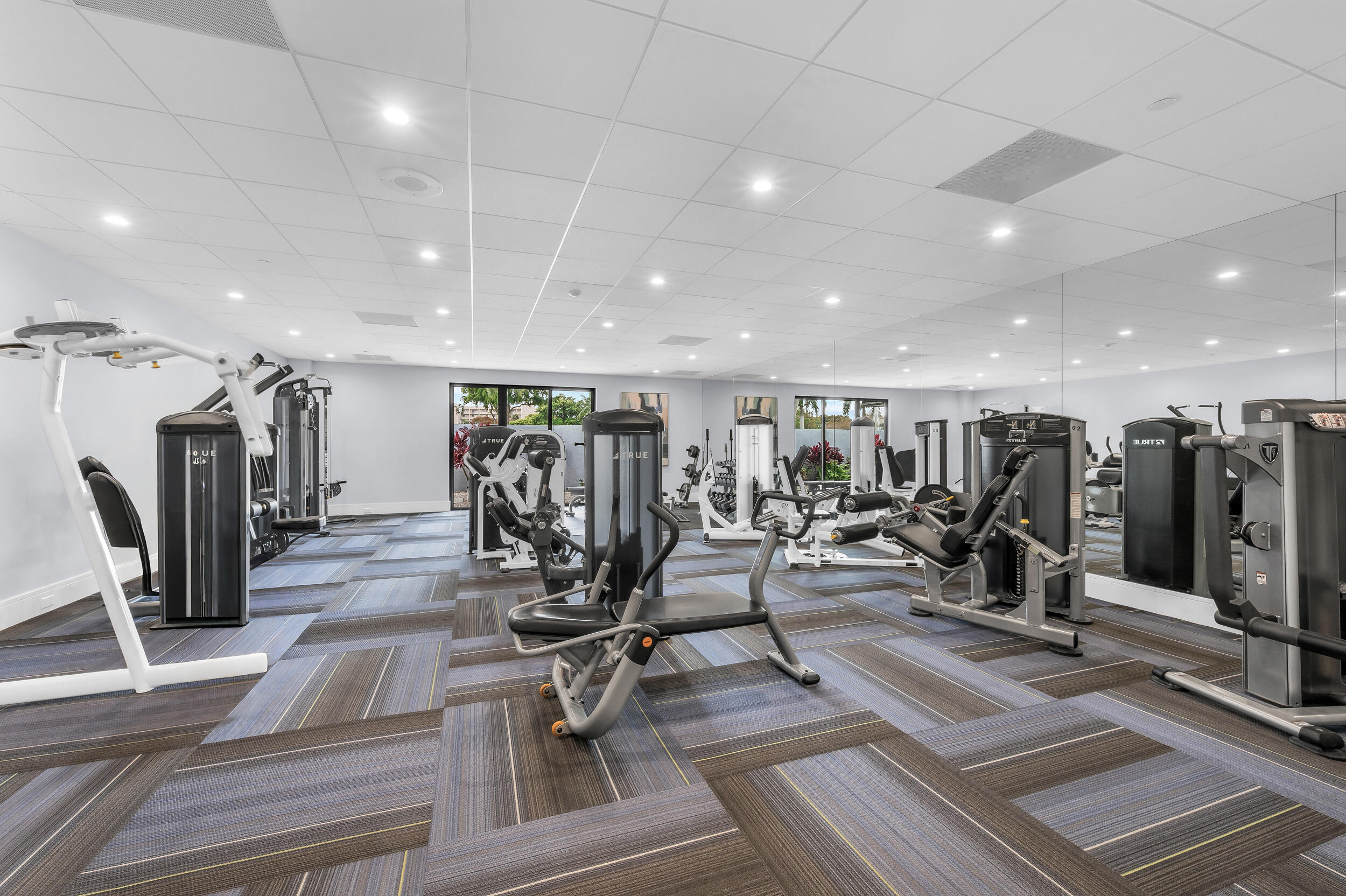 14475 Strathmore Lane, Unit 602 Delray Beach, FL 33446 - Photo 25 of 28 a view of a room with gym equipment