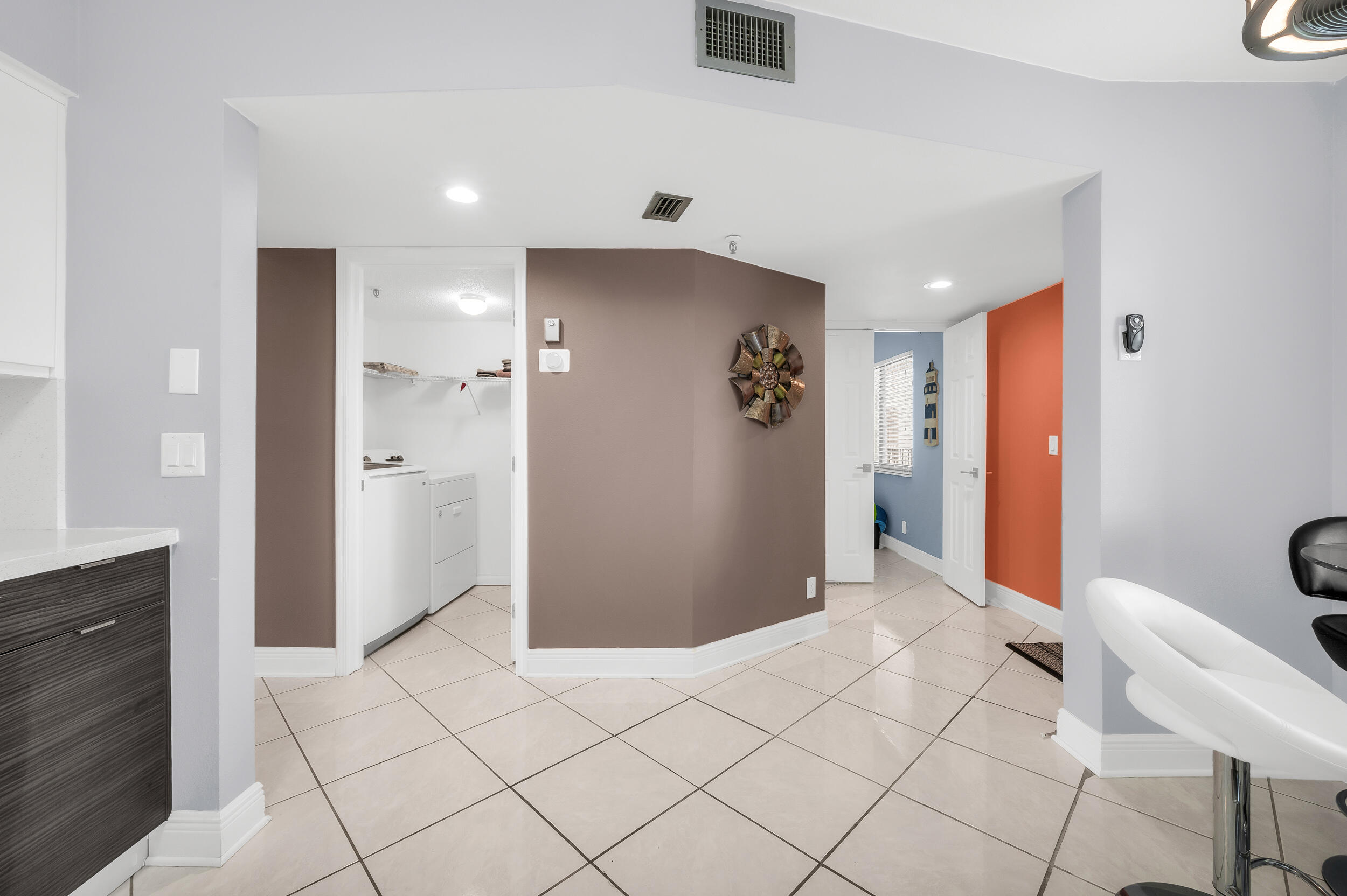 14475 Strathmore Lane, Unit 602 Delray Beach, FL 33446 - Photo 4 of 28 a view of a hallway with bathroom