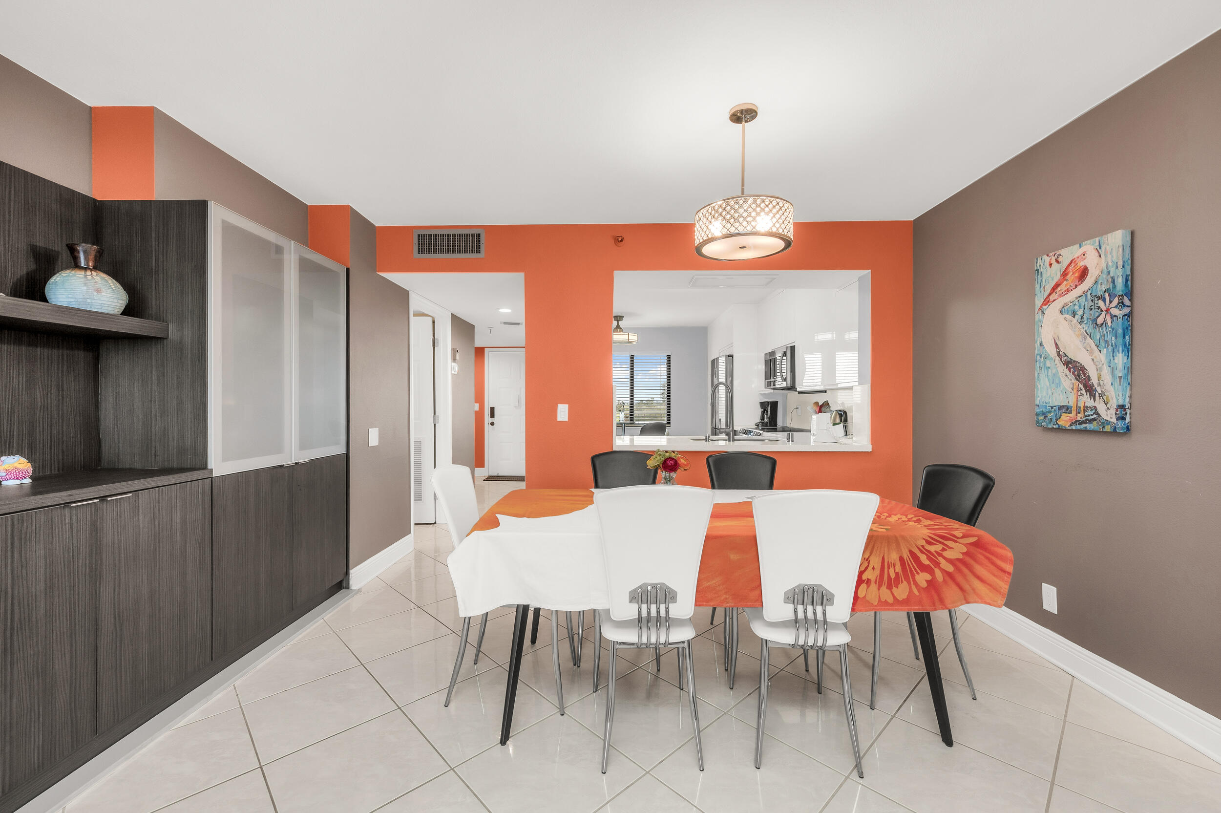 14475 Strathmore Lane, Unit 602 Delray Beach, FL 33446 - Photo 7 of 28 a view of a dining room with furniture
