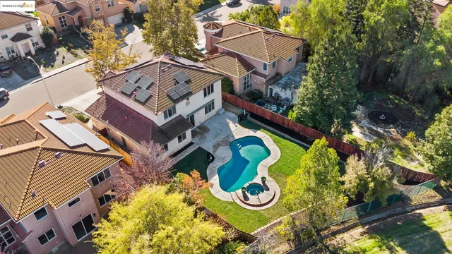 aerial view of a house with a swimming pool
