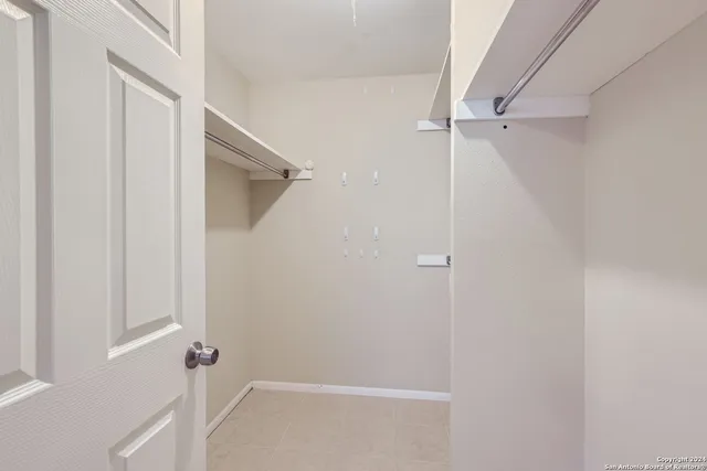 a view of a room with a window