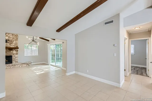 a view of an empty room and window