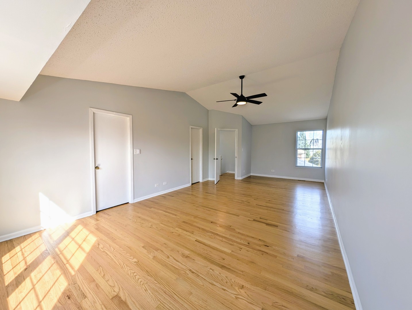 1030 Oak Ridge Drive Streamwood, IL 60107 - Photo 12 of 19 a view of empty room with wooden floor