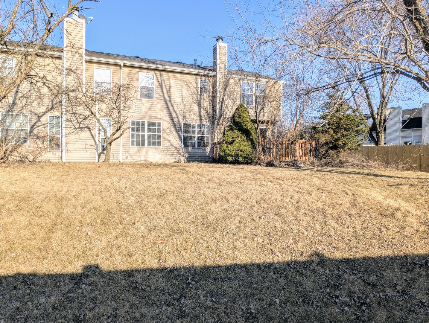 1030 Oak Ridge Drive Streamwood, IL 60107 - Photo 19 of 19 a view of a backyard of the house