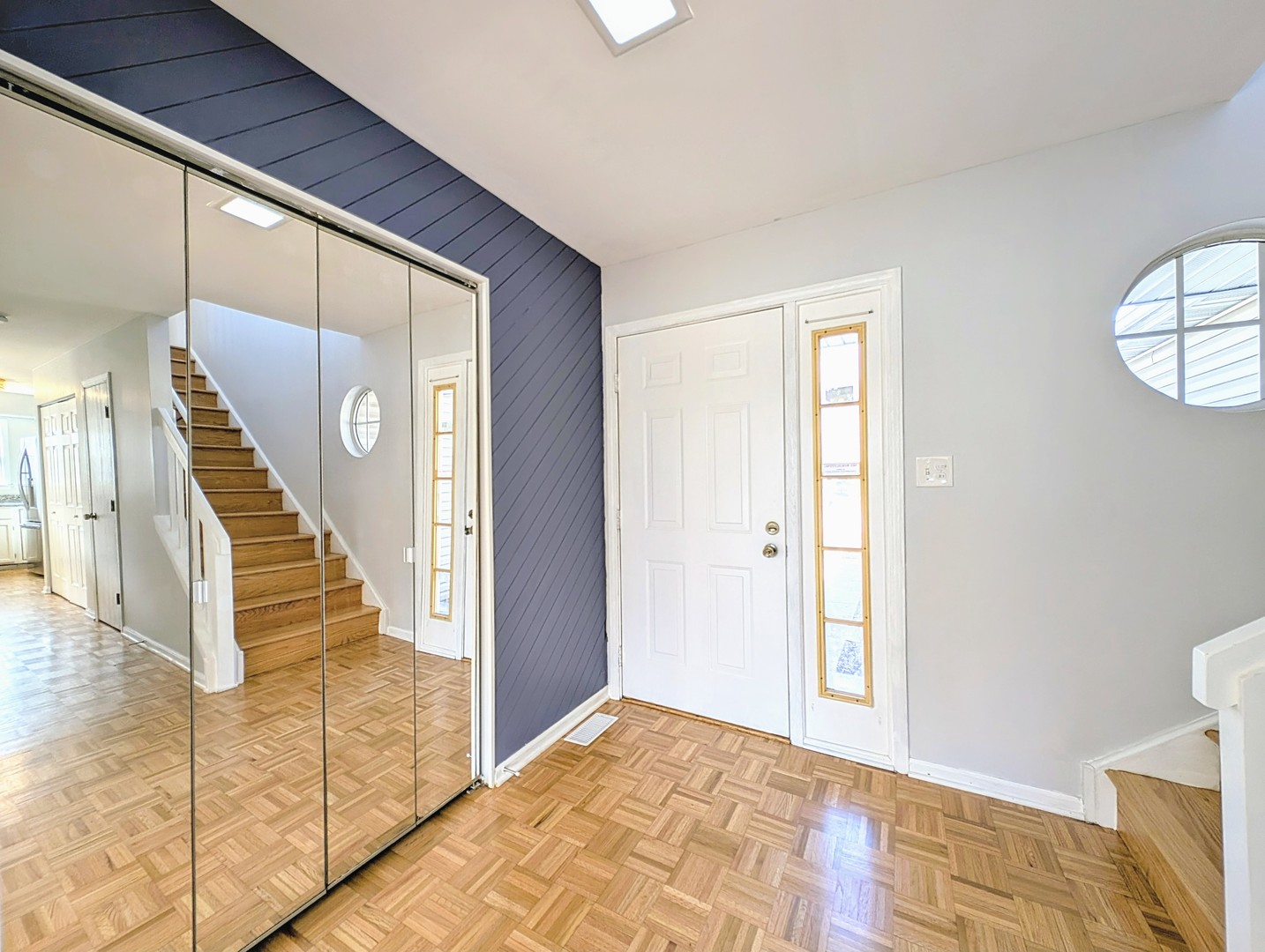 1030 Oak Ridge Drive Streamwood, IL 60107 - Photo 2 of 19 a view of a hallway with windows