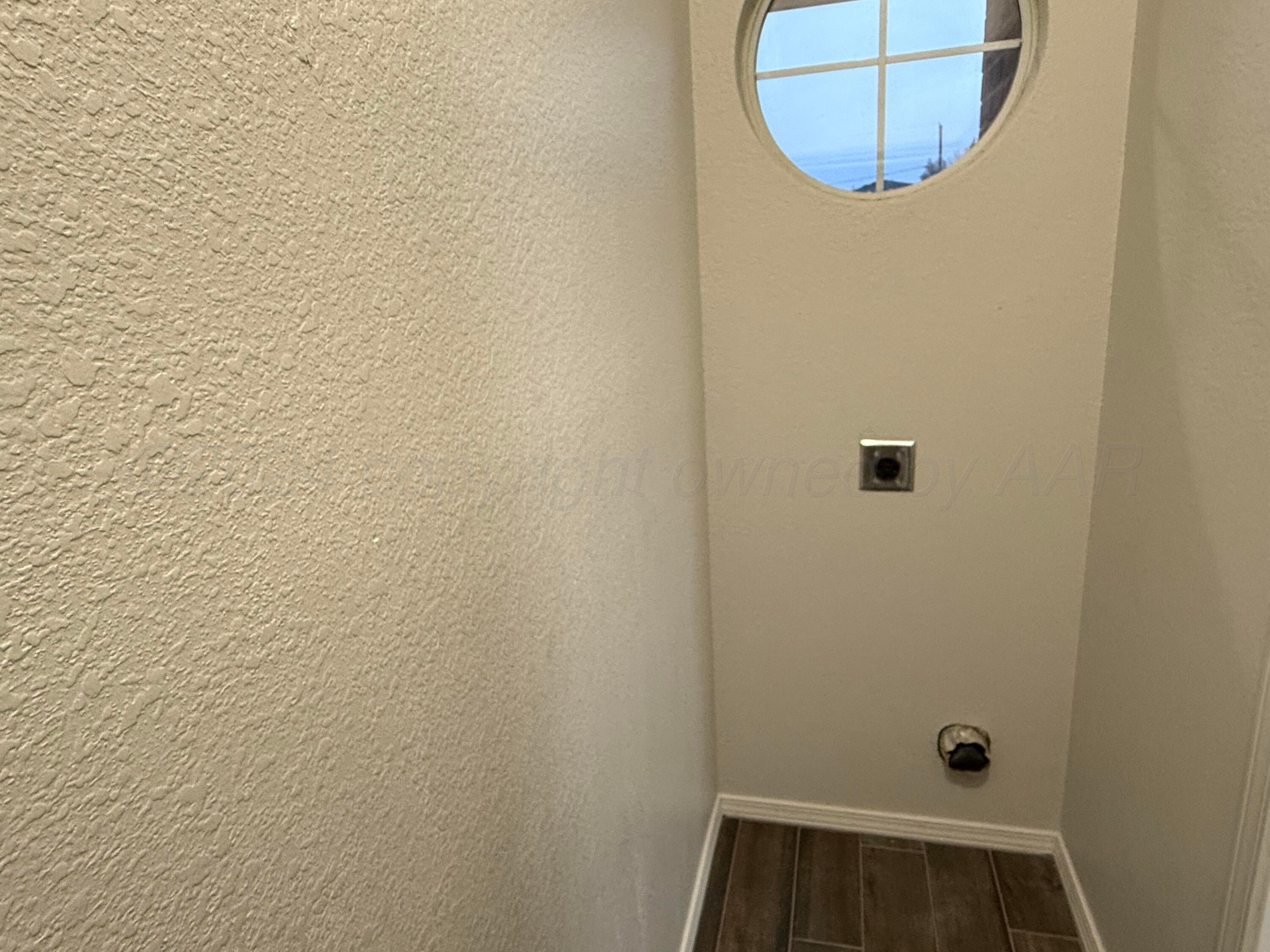 4914 Capulin Lane Amarillo, TX 79110 - Photo 22 of 25 a bathroom with a sink