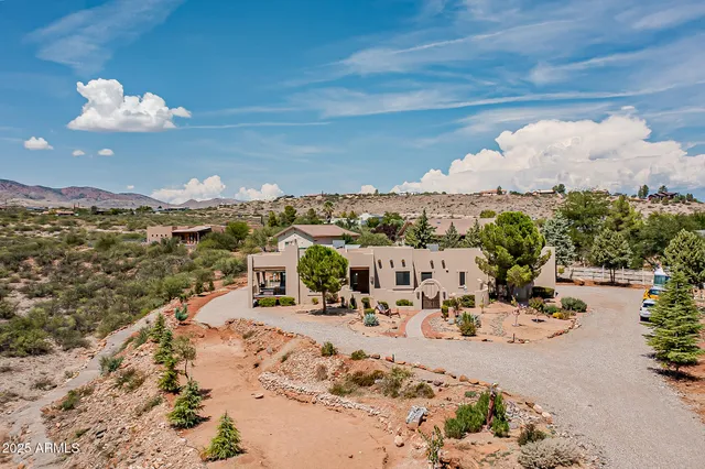 an aerial view of residential house with outdoor space