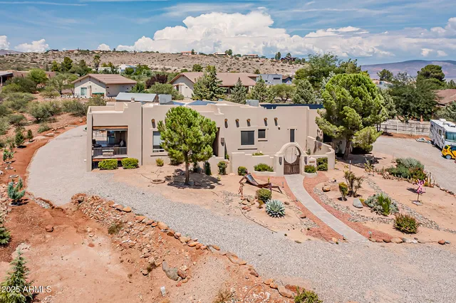 a balcony with furniture and wooden floor