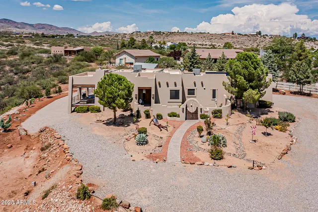a outdoor space with patio the couches and chairs with wooden floor