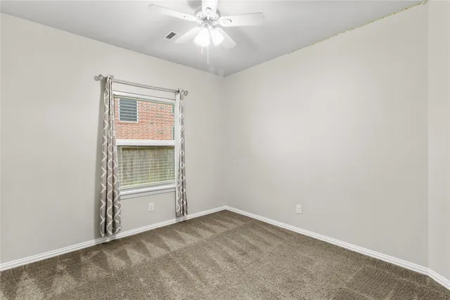 a bathroom with a sink and a mirror with toilet
