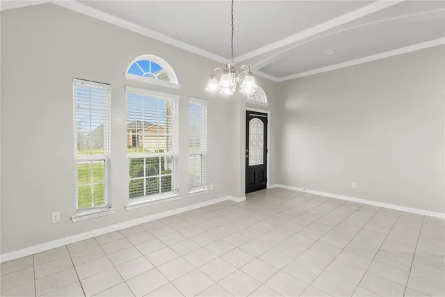 a kitchen with stainless steel appliances granite countertop a stove top oven a sink dishwasher and a refrigerator