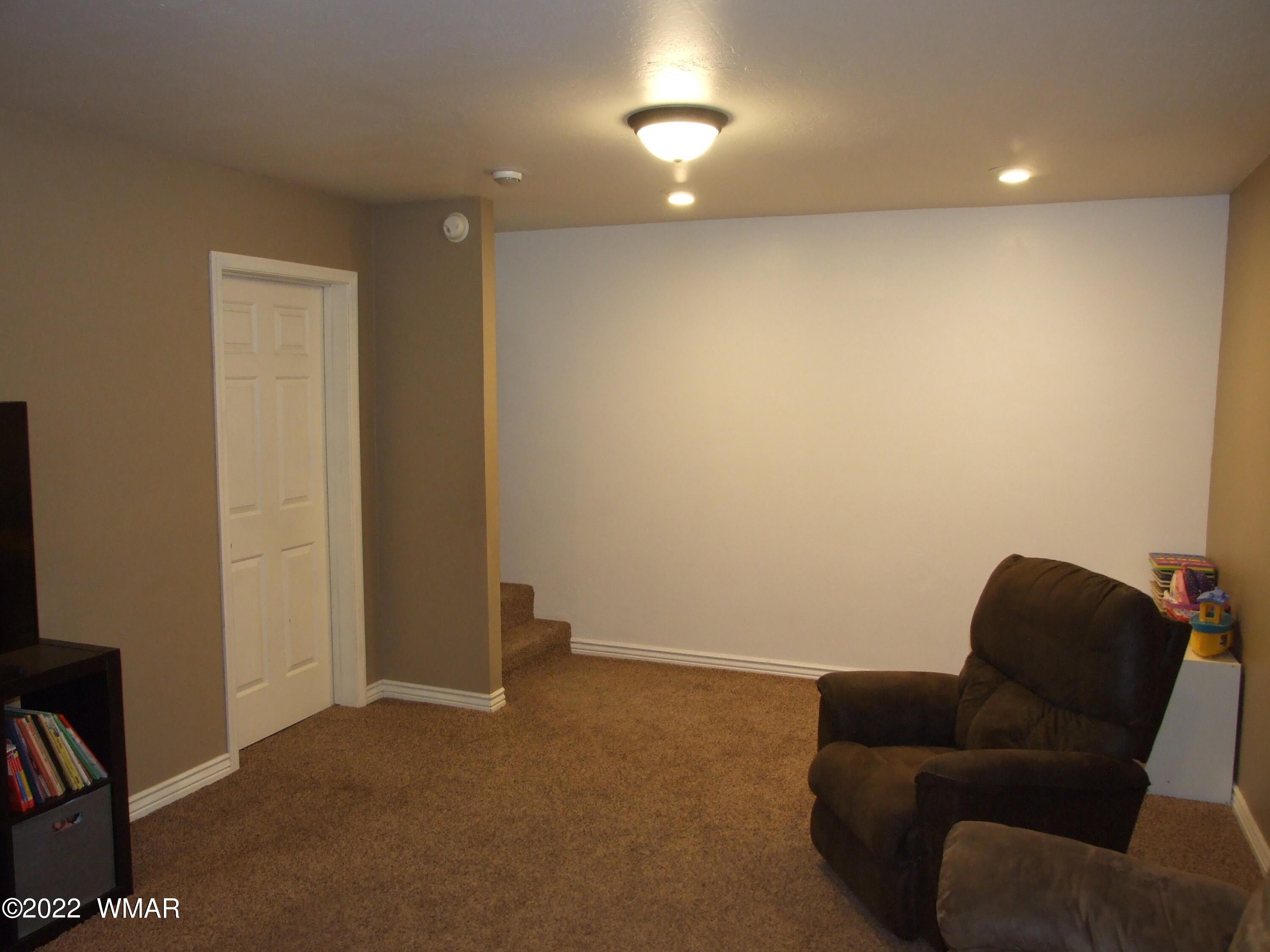 49 North 4th W Street Snowflake, AZ 85937 - Photo 34 of 34 a living room with furniture and a couch