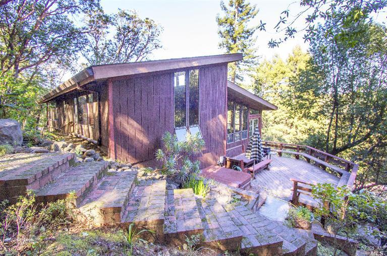 53 Redwood Road Fairfax, CA 94930 - Photo 1 of 1 a view of a house with a yard and garden