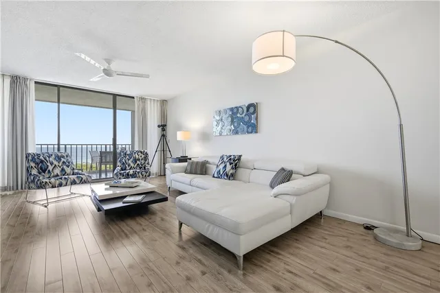 a kitchen with a sink and white cabinets