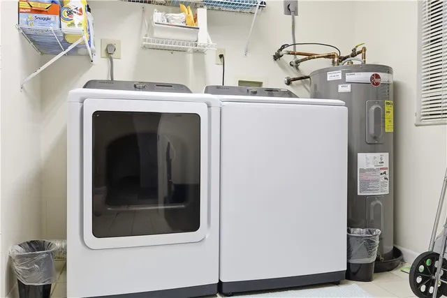 a utility room with dryer and washer