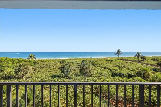 a view of ocean from a balcony