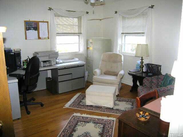1105 Ralph Drive Cary, NC 27511 - Photo 11 of 12 a living room with furniture and a window