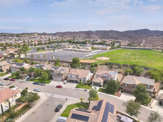 a view of a city with a lake