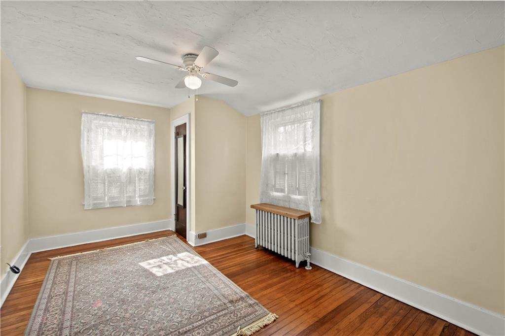 705 Walnut Street Crescent, PA 15046 - Photo 26 of 41 a view of an empty room with glass door and a window
