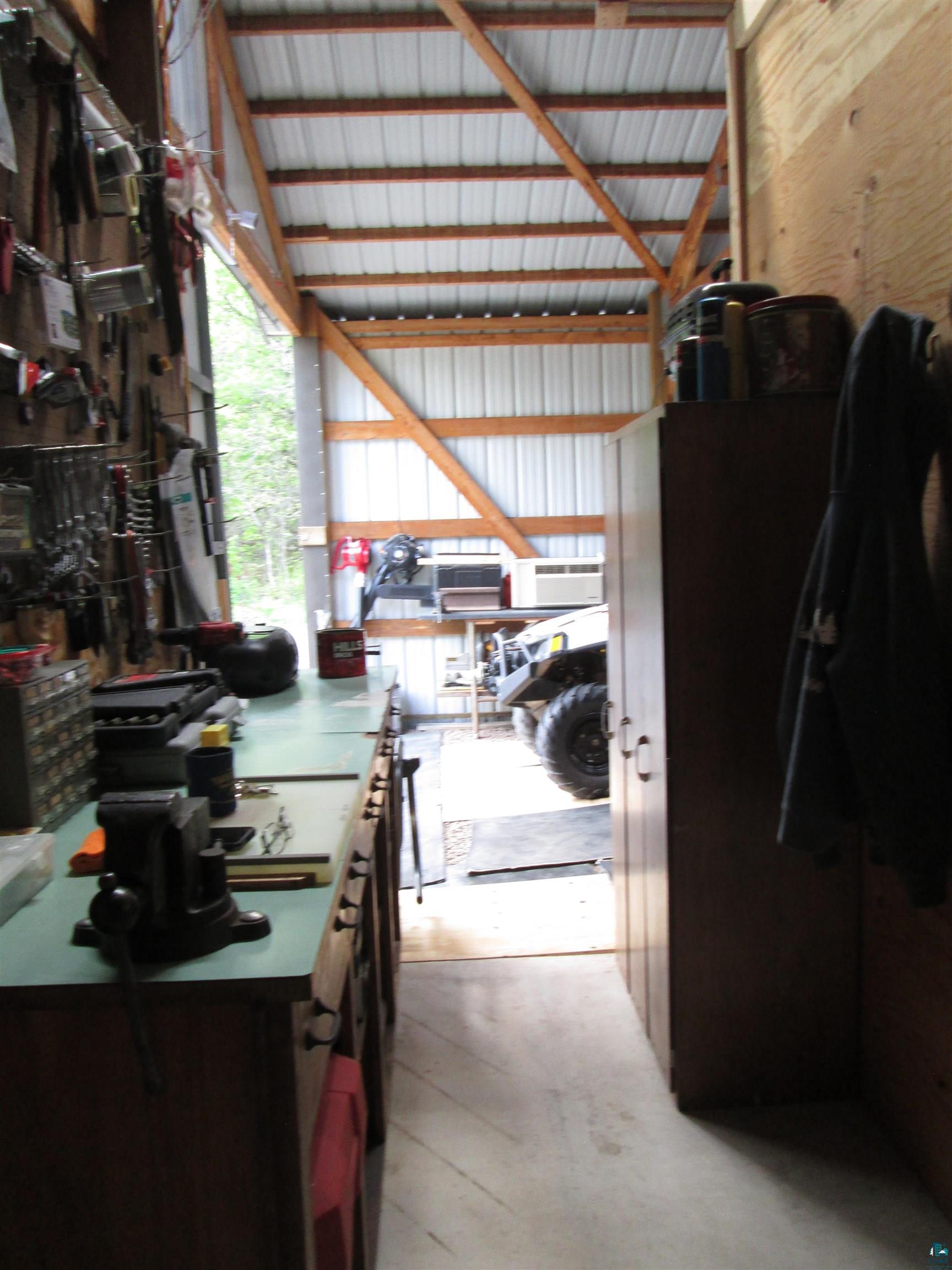11521 Cheney Lake Road Solon Springs, WI 54873 - Photo 22 of 26 Interior space with a workshop area