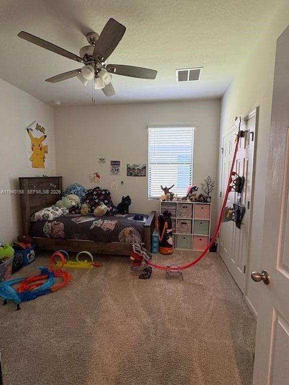 571 Old Country Rd S East Palm Bay, FL 32909 - Photo 27 of 29 a view of a room with gym equipment