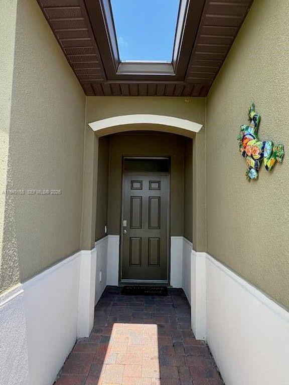 571 Old Country Rd S East Palm Bay, FL 32909 - Photo 3 of 29 a view of an entryway