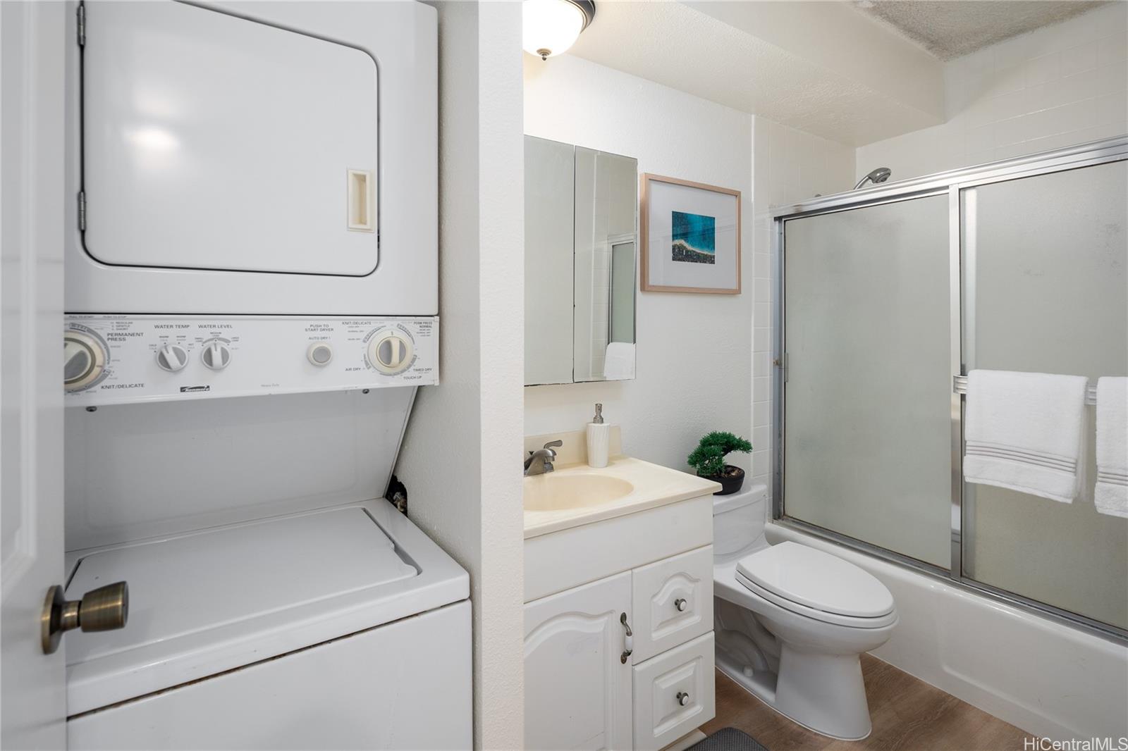 2092 Kūhiō Avenue, Unit 1003 Honolulu, HI 96815 - Photo 10 of 17 a bathroom with a sink toilet and shower