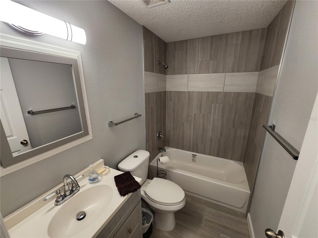 38 General Doolittle Road Daytona Beach, FL 32124 - Photo 12 of 19 a bathroom with a sink toilet and shower