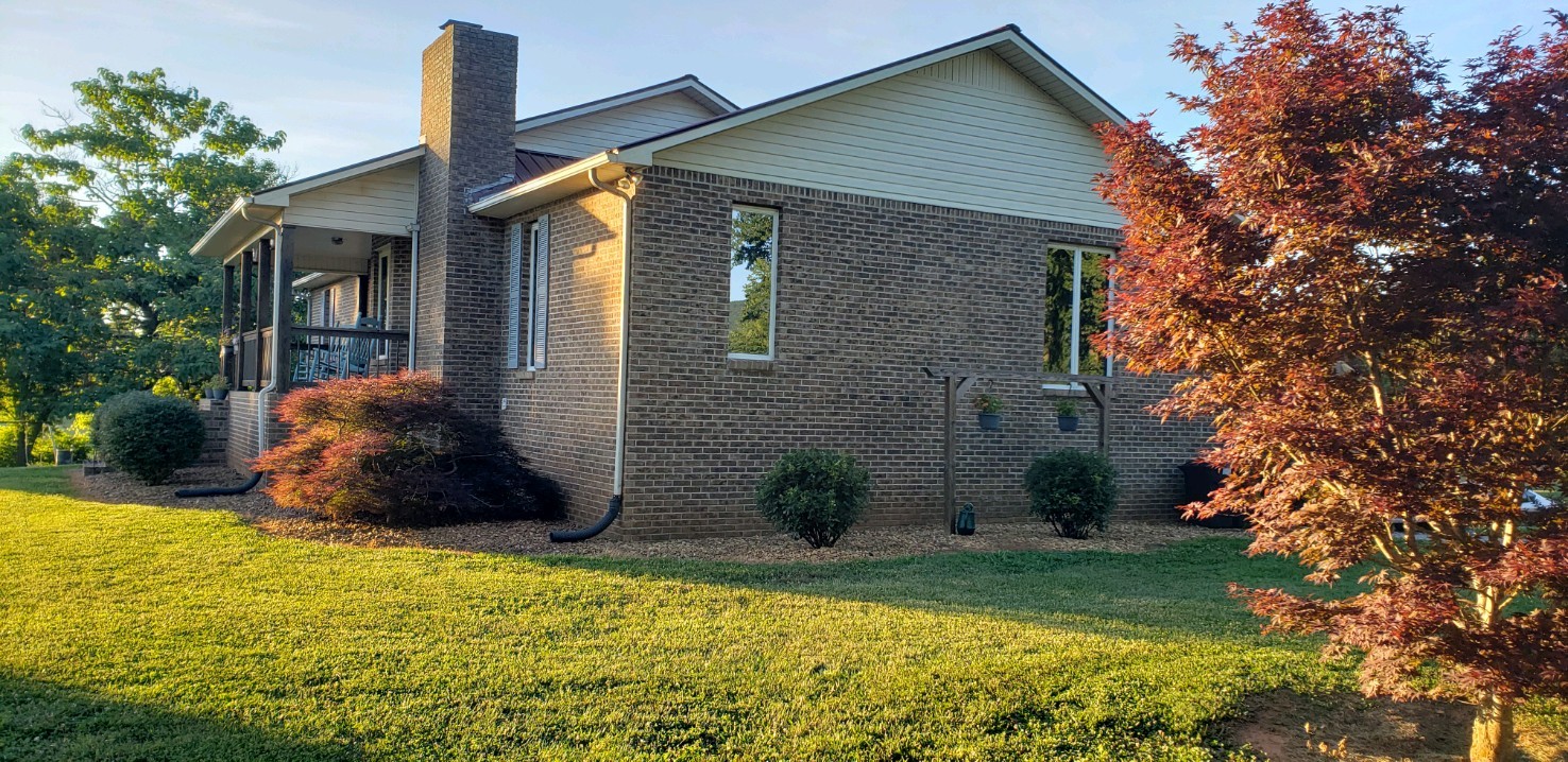 538 Dotson Cemetery Road Decherd, TN 37324 - Photo 69 of 70 a front view of a house with garden